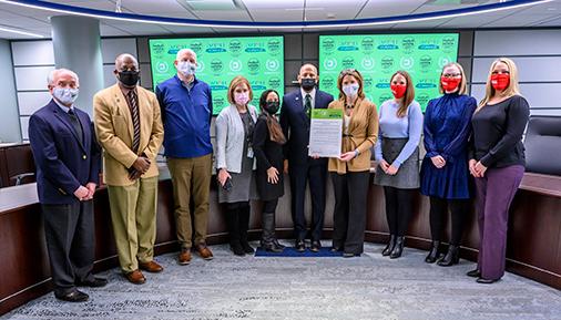 Leaders from HVCC and Living Resources with signed agreement